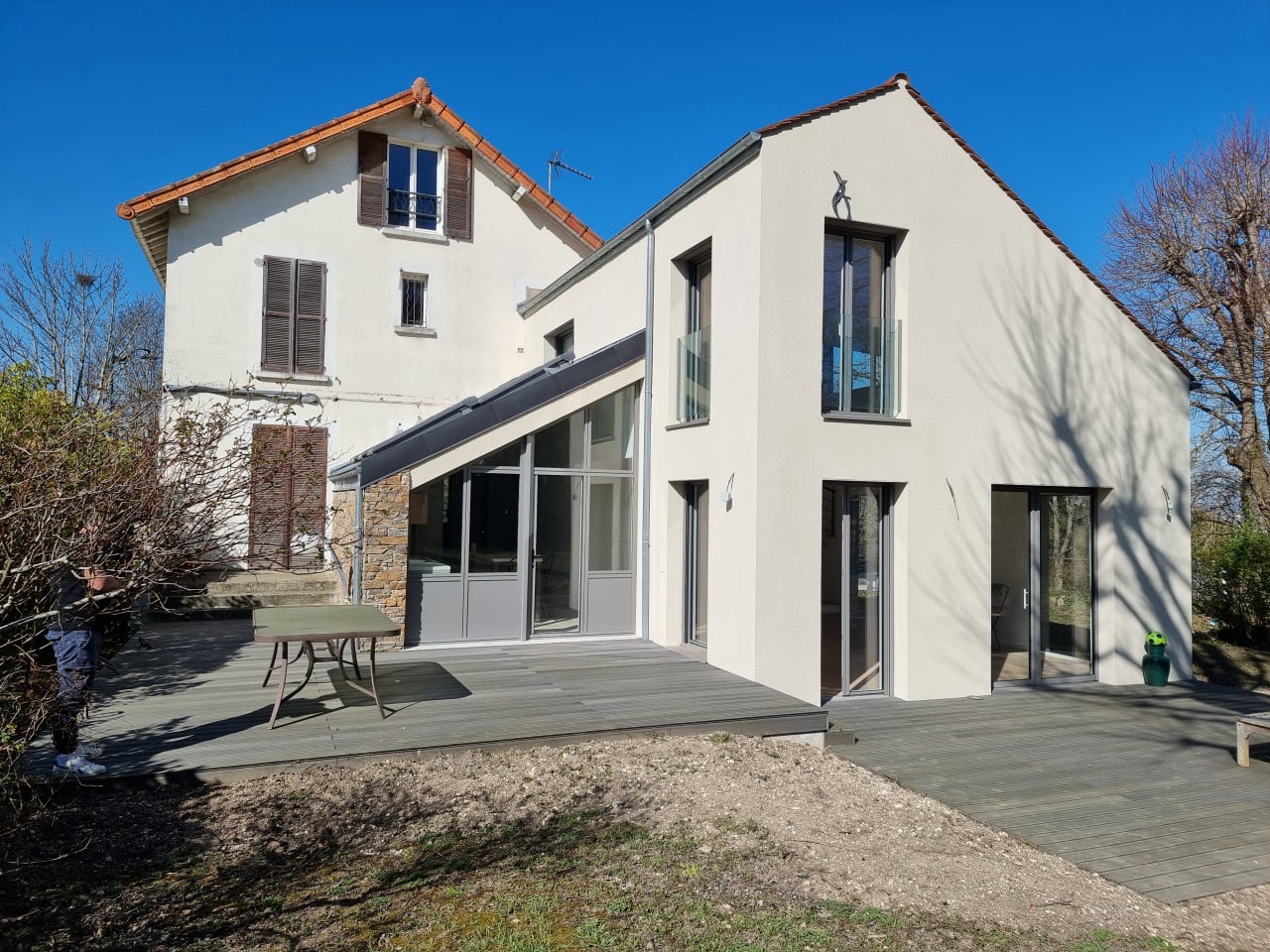 Maison rénovée et agrandie par Rénovations d'Ile de France
