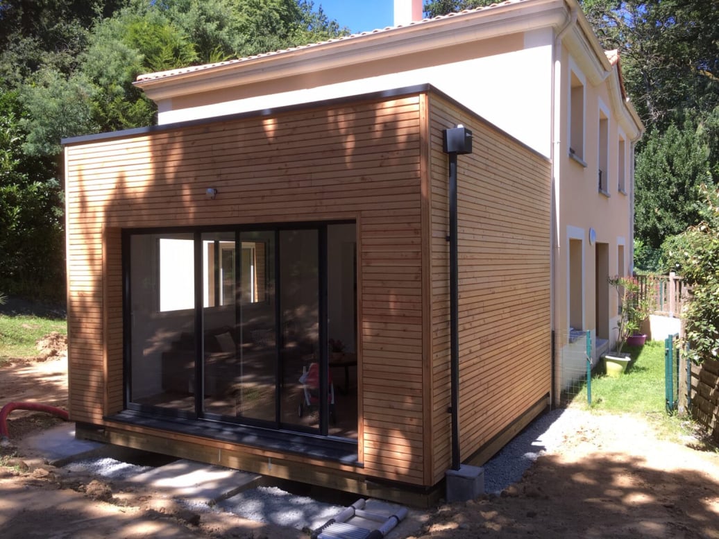 Extension en ossature bois par Alliance Group Rénovation 108